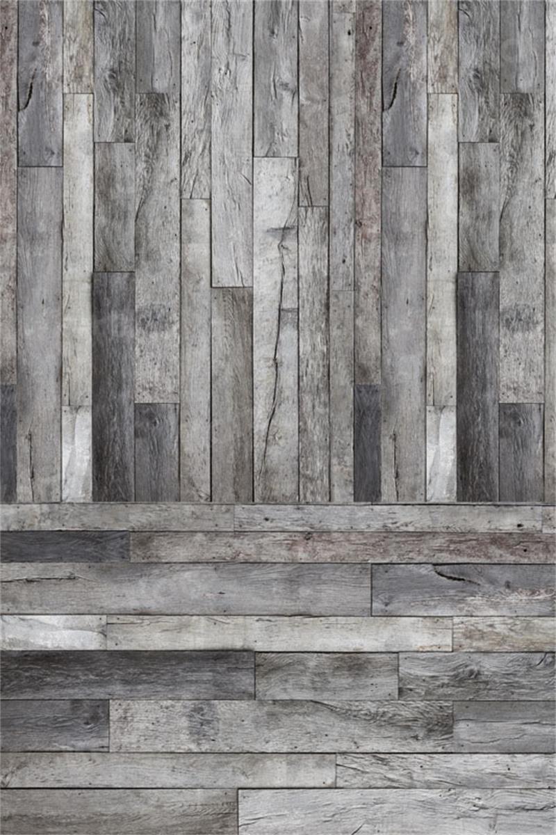 Tablón de madera agrietado gris para empalmar como fondo fotográfico.