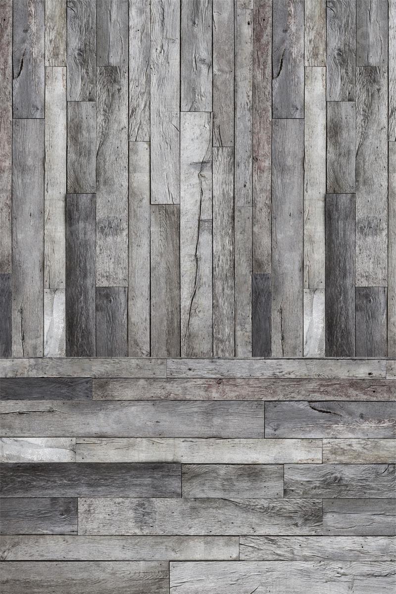 Tablón de madera agrietado gris para empalmar como fondo fotográfico.