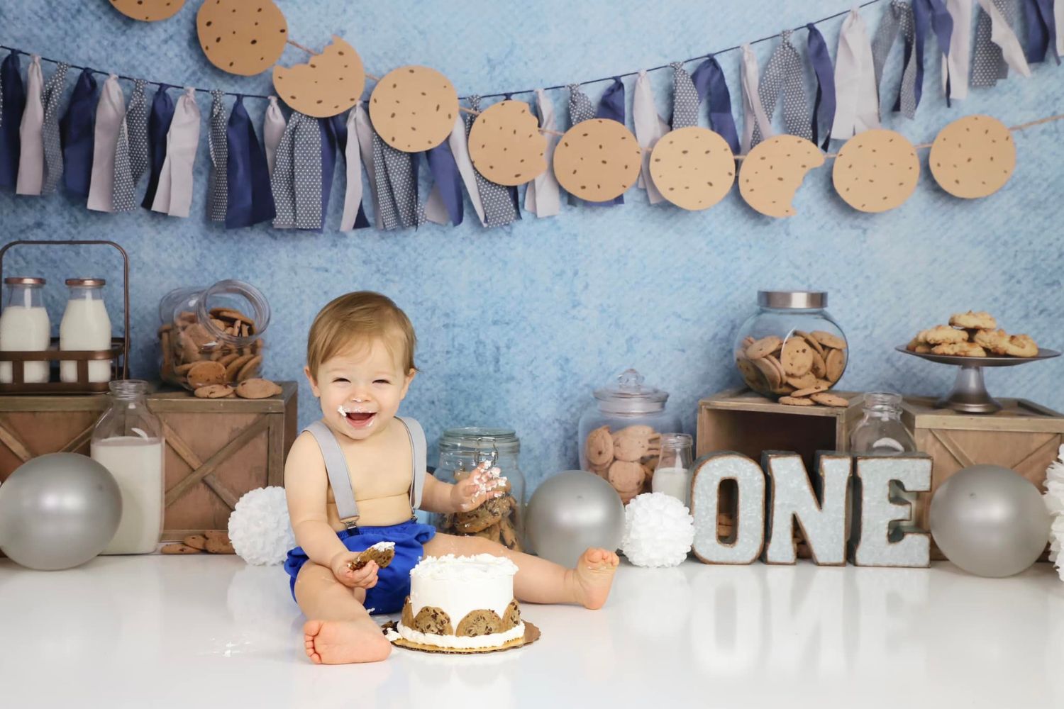 baby boy's cake smash photo with Kate Milk Cookies Blue Backdrop Designed by Melissa King