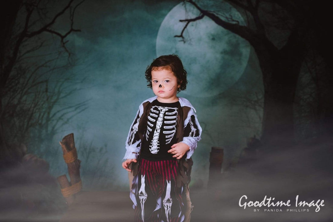 Halloween photo of a costumed boy with Kate Photography Fantastic Halloween Backdrops Forest Night Moon