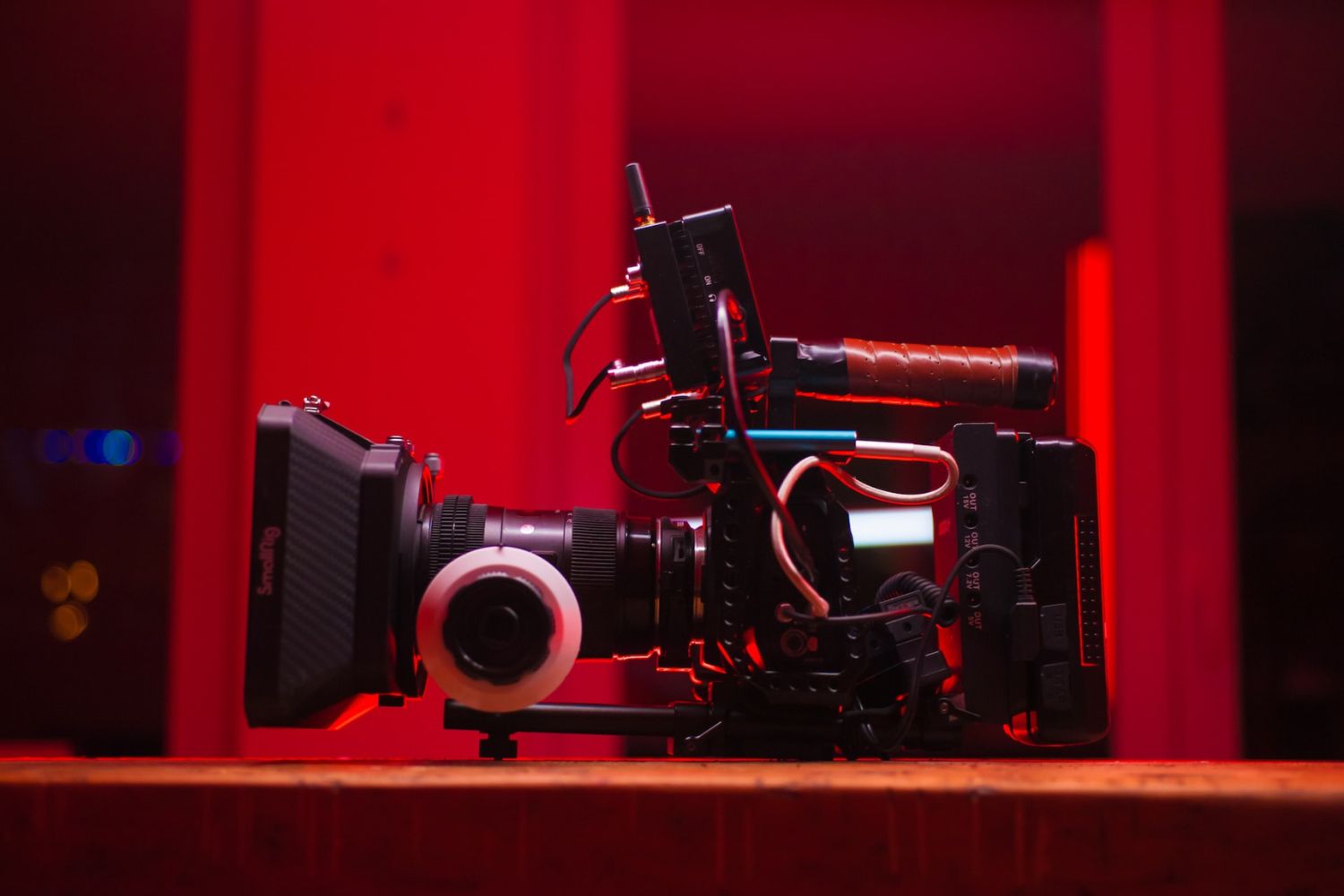 Blackmagic camera in red light Photo by Levi Stute on Unsplash