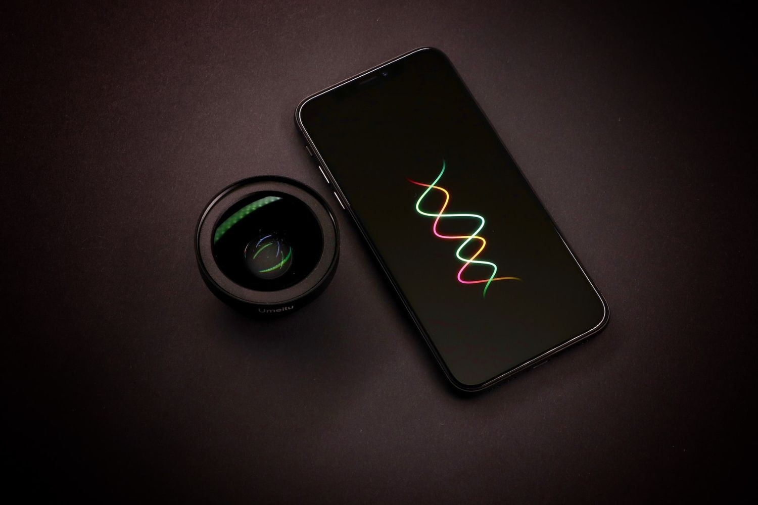 photo of phone and lens by Todd Jiang on Unsplash