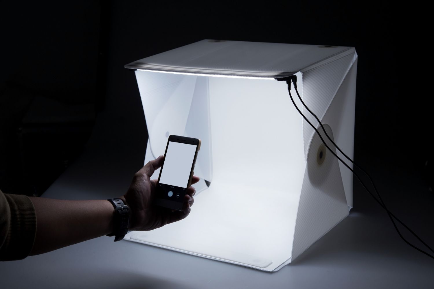 take photos in light boxes Photo by Third of November on shutterstock