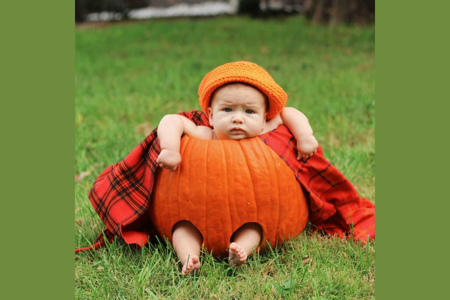 baby is wearing pumpkin cloth Photo by Lydia Winters on unsplash