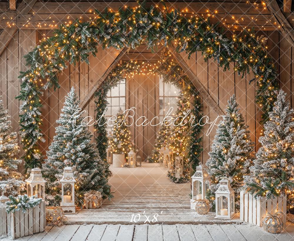 Kate Christmas Barn Garland Arch Snowy Pine Trees Lanterns Rustic Backdrop Designed by Emetselch