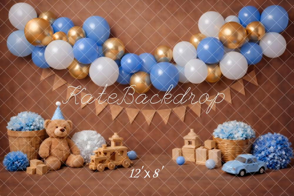 Kate Cake Smash Blue Gold Balloon Garland Teddy Bear Toy Car Brown Printed Backdrop Designed by Vertigo Productions
