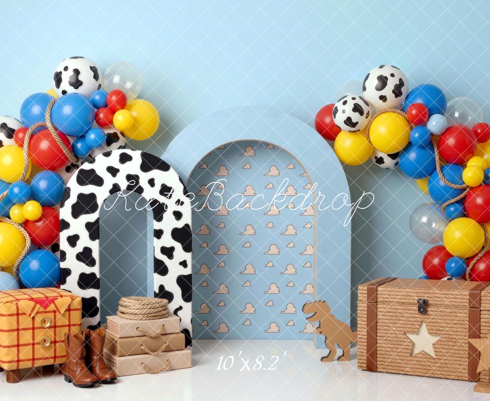 Kate Birthday Cowboy Cow Print Arch Balloons Toy Chest Blue Clouds Printed Backdrop Printed Backdrop Designed by Mini MakeBelieve