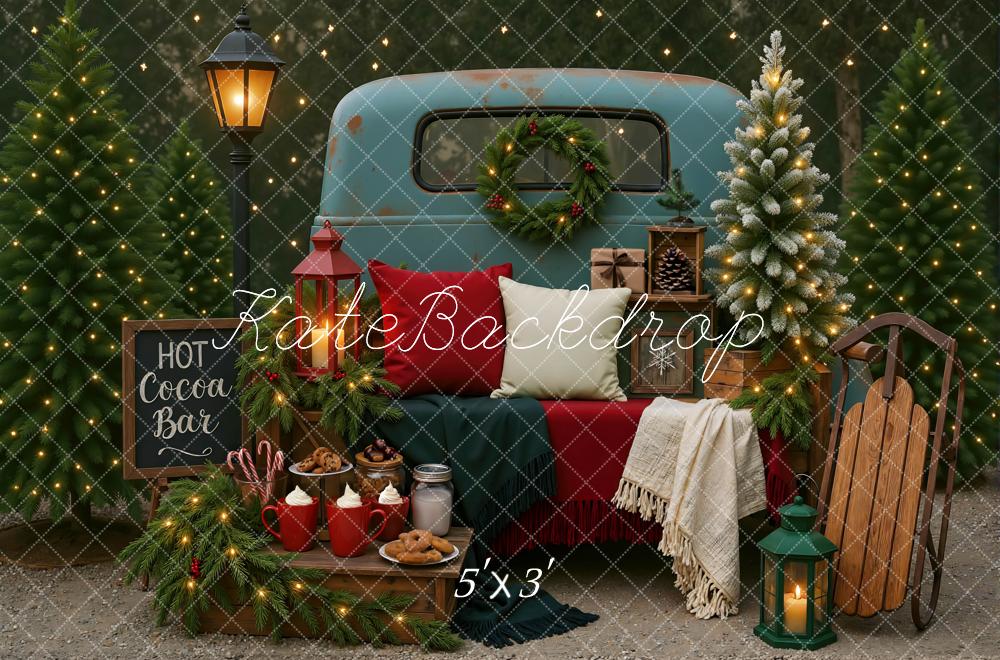 Kate Christmas Truck Hot Cocoa Bar Trees Lantern Sled Backdrop Designed by Mini MakeBelieve