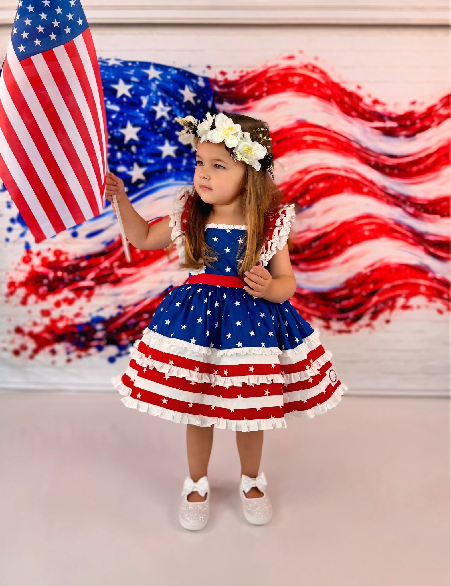 Kate Fourth Of July American Flag Paint Splash on White Brick Wall Printed Backdrop Designed by Mini MakeBelieve