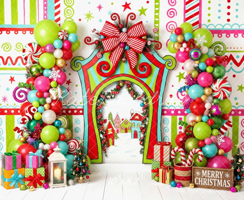 Kate Christmas Cake Smash Whimsical Candyland Balloon Arch Presents Printed Backdrop Designed by Patty Roberts