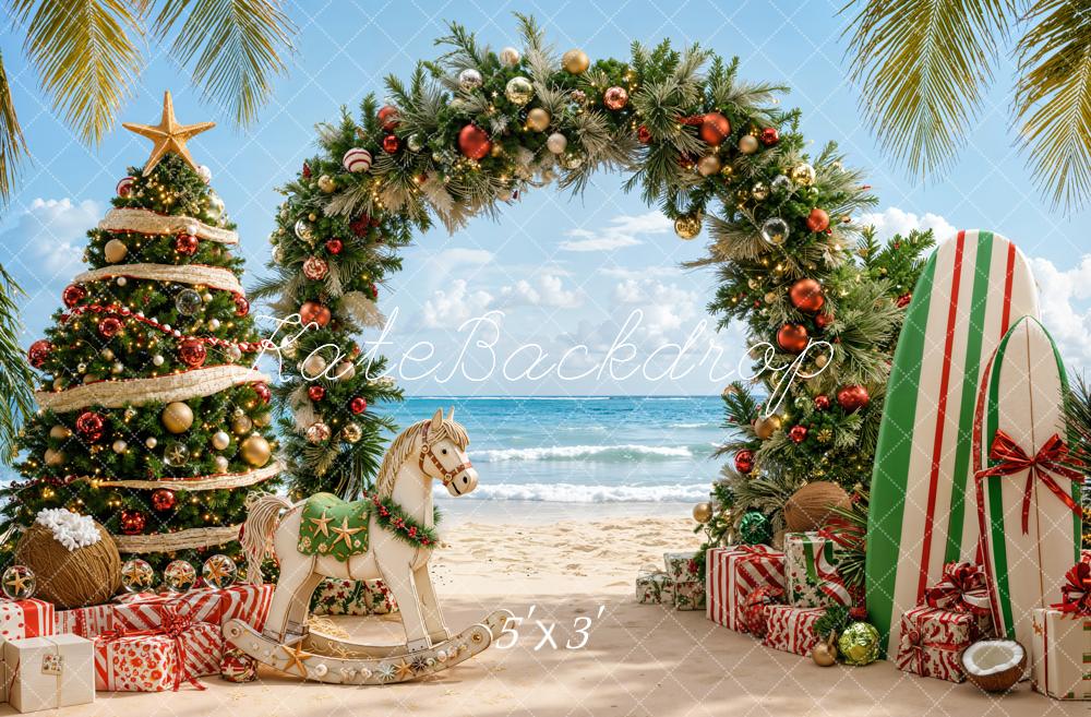 Kate Christmas Beach Tree Pine Arch Surfboard Rocking Horse Printed Backdrop Designed by Emetselch