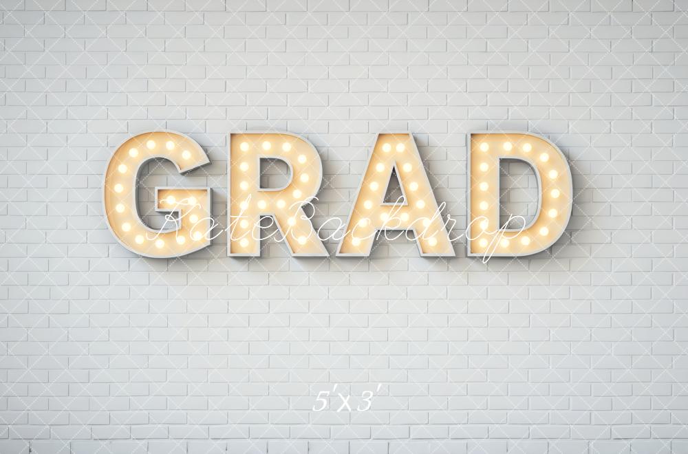 Kate Graduation Grad Marquee Letters White Brick Wall Printed Backdrop Designed by Mini MakeBelieve