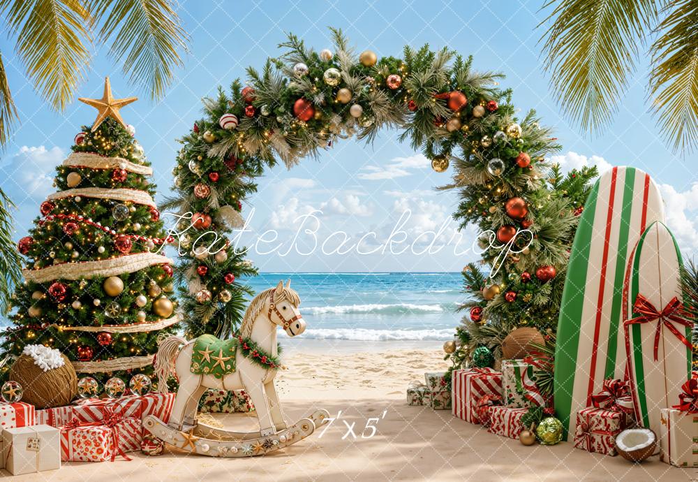 Kate Christmas Beach Tree Pine Arch Surfboard Rocking Horse Printed Backdrop Designed by Emetselch