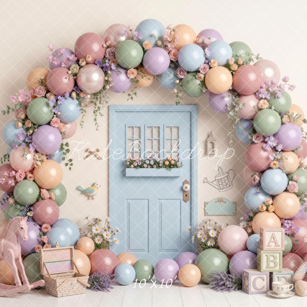 Kate Spring Birthday Pastel Balloon Flower Arch Blue Door Rocking Horse Teddy Bear Printed Backdrop Designed by Mini MakeBelieve