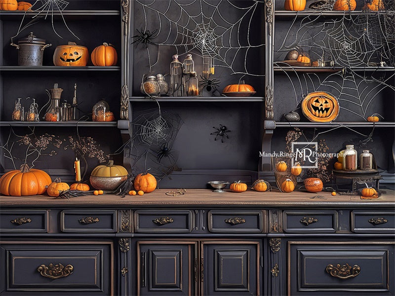 Kate Spooky Kitchen with Spiderwebs and Pumpkin Backdrop Designed by Mandy Ringe Photography