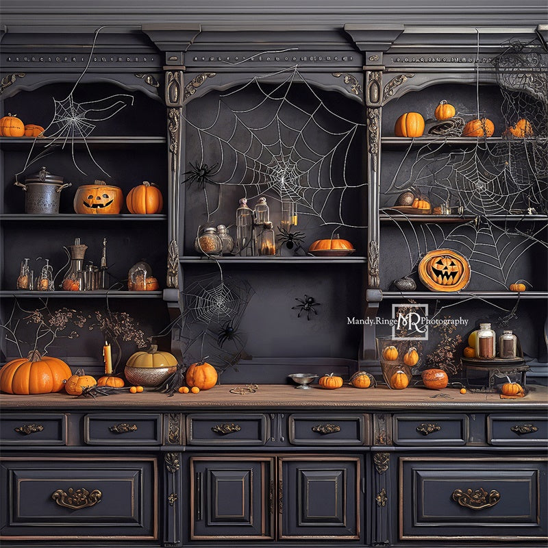 Kate Spooky Kitchen with Spiderwebs and Pumpkin Backdrop Designed by Mandy Ringe Photography