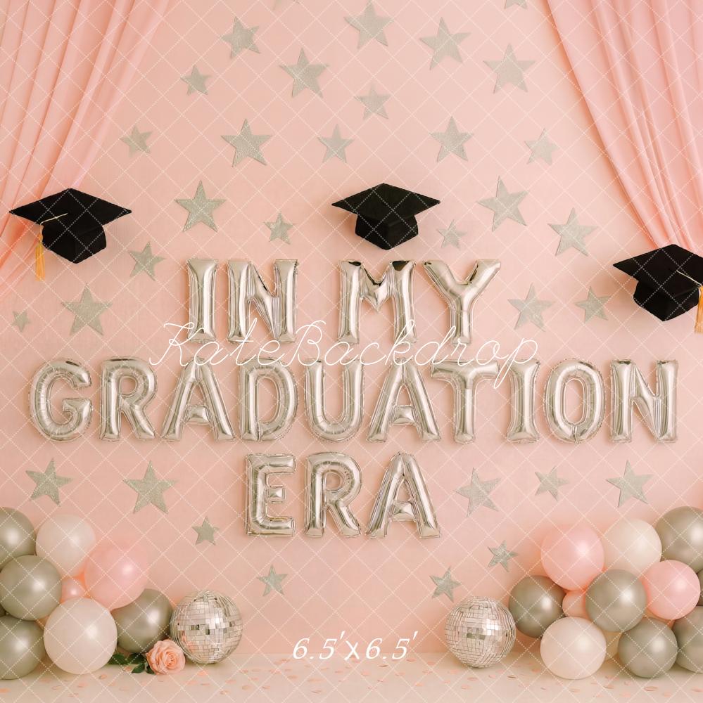 A 6.5ft x 6.5ft graduation-themed backdrop with balloons and 'In My Graduation Era' text on a pink background.