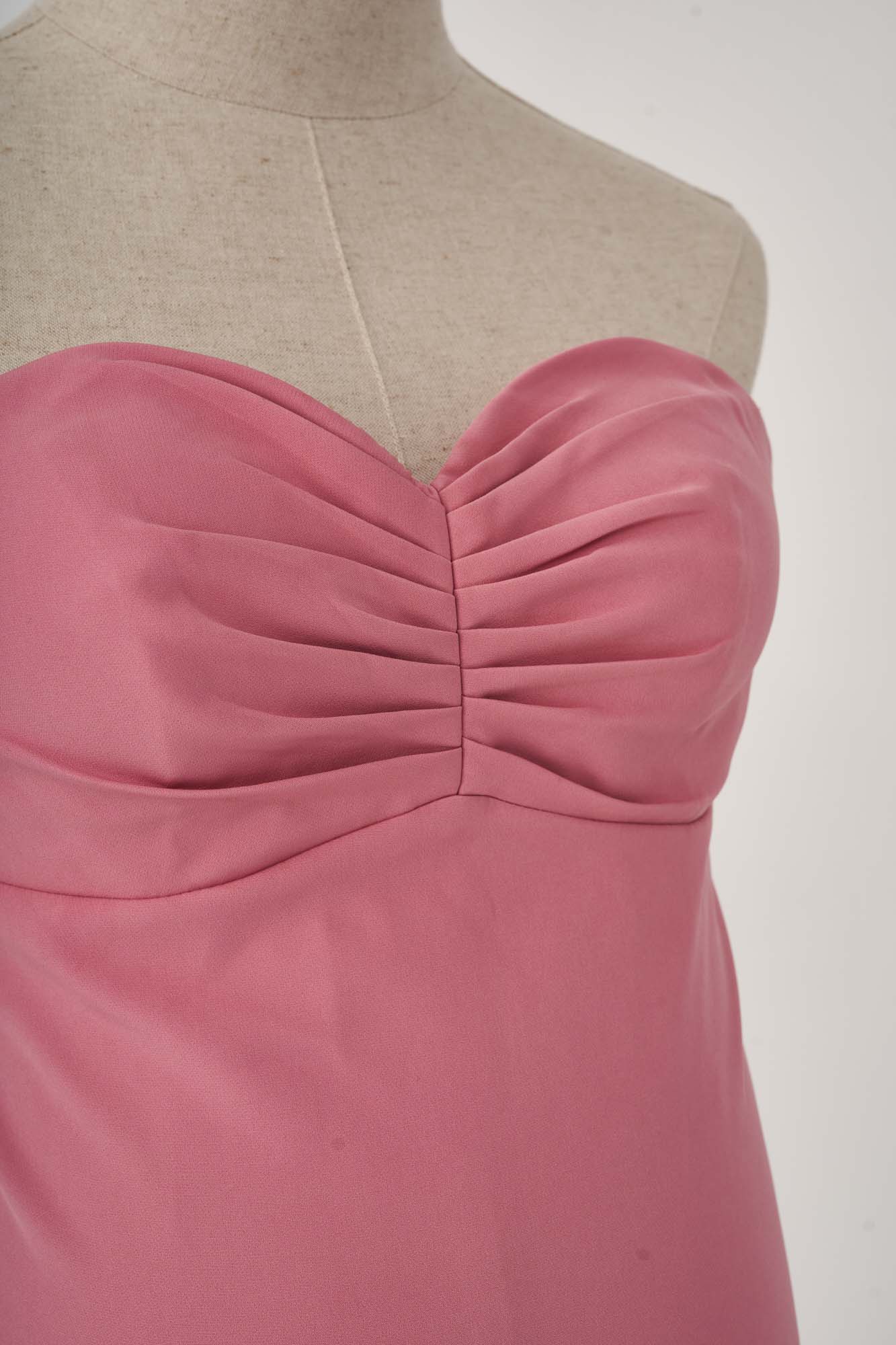 Detailed photos of breasts in pink cake maternity dress