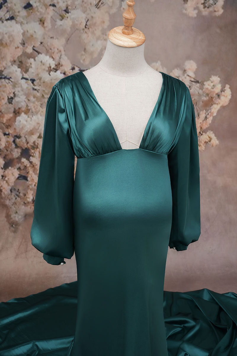 Green long-sleeved satin maternity dress front detail shot
