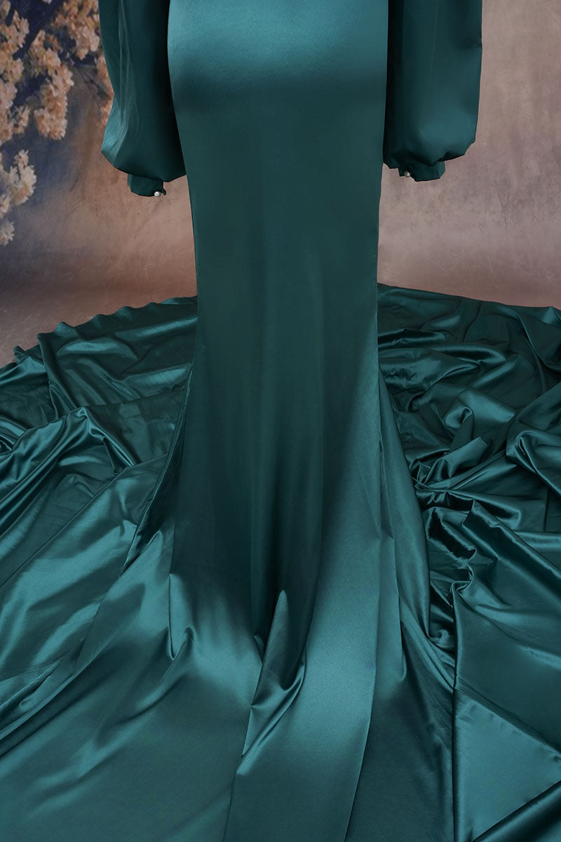 Detailed photo of green long-sleeved satin maternity dress skirt
