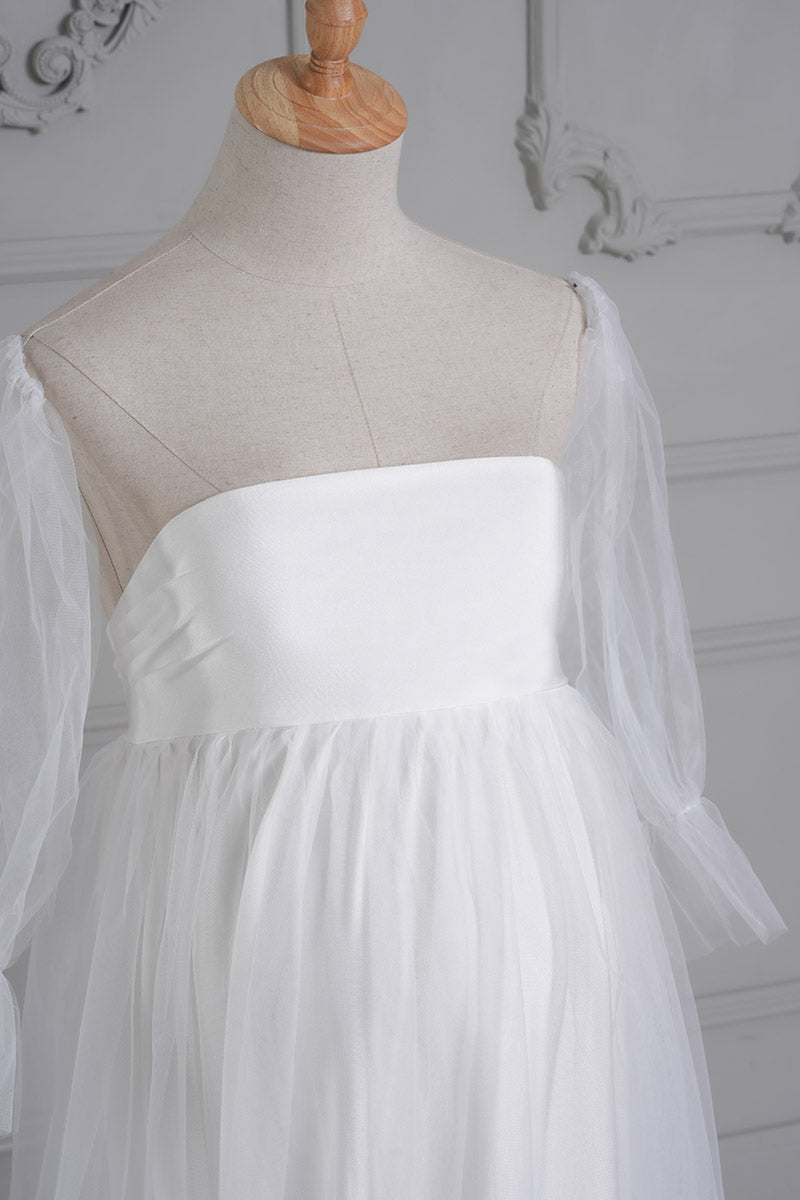 Detail shot of white tubular mesh maternity maxi dress