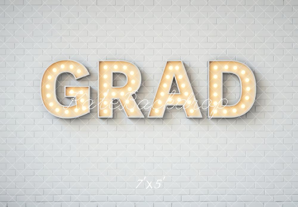 Kate Graduation Grad Marquee Letters White Brick Wall Printed Backdrop Designed by Mini MakeBelieve