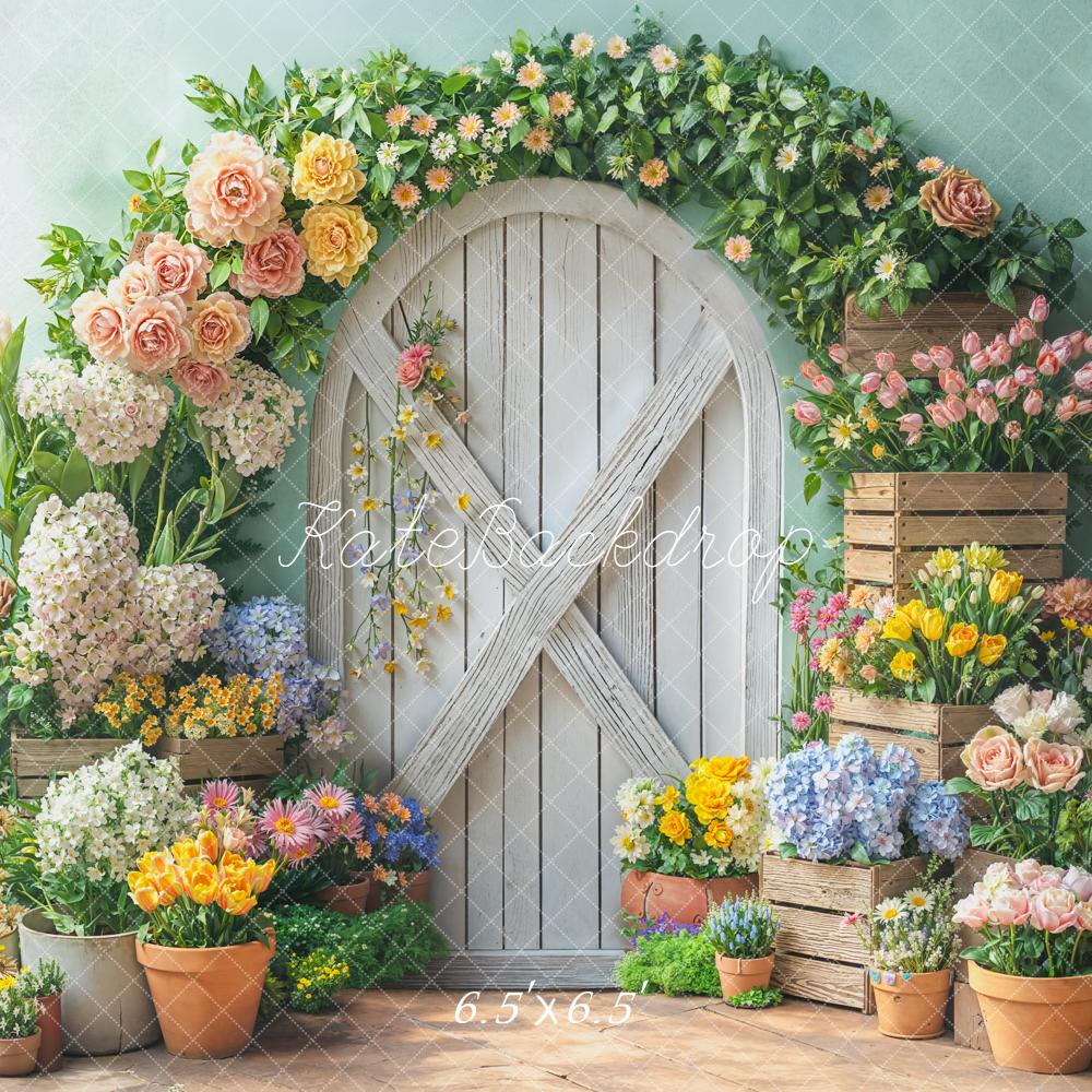 Kate Spring Flower Arch White Door Wooden Crates Pastel Green Backdrop Designed by Emetselch