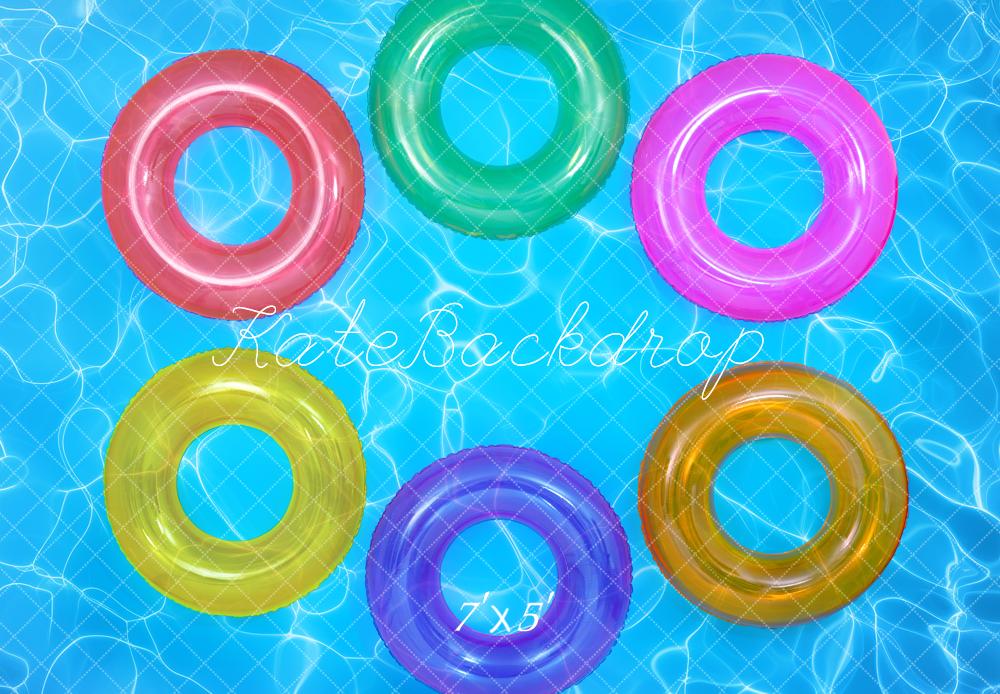 Vibrant Floating Pool Rings Backdrop