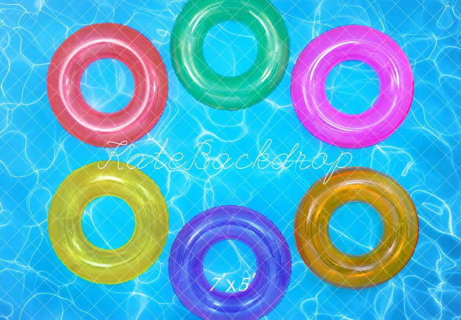 Vibrant Floating Pool Rings Backdrop