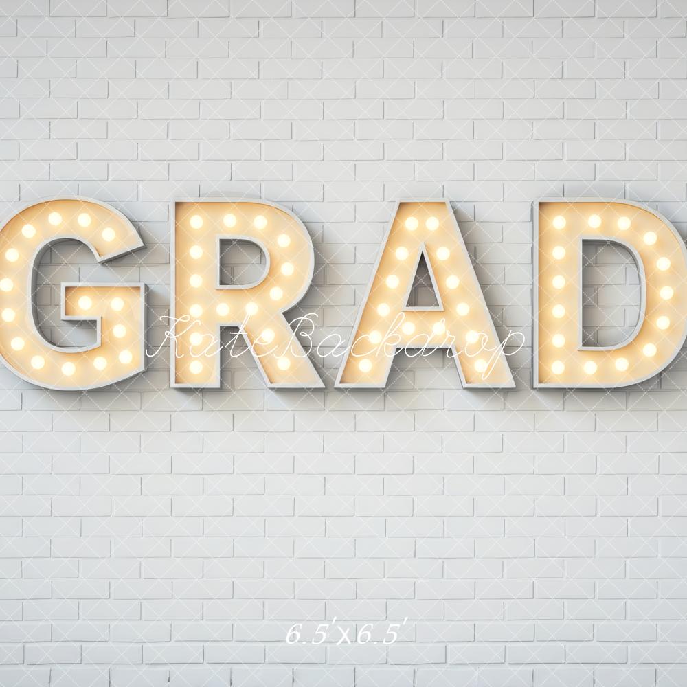 Kate Graduation Grad Marquee Letters White Brick Wall Printed Backdrop Designed by Mini MakeBelieve