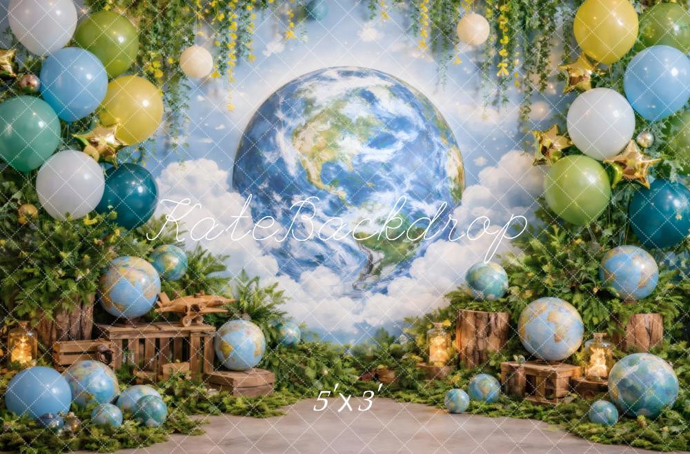 Kate Earth Globe Balloons Greenery Wooden Crates Printed Backdrop Designed by Vertigo Productions