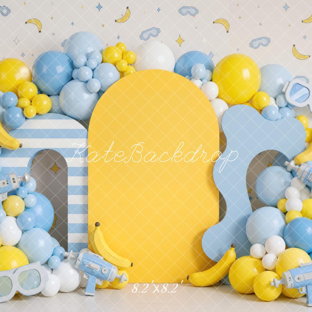 Kate Cake Smash Playful Banana Goggles Balloon Arch Yellow Blue Printed Backdrop Designed by Mini MakeBelieve