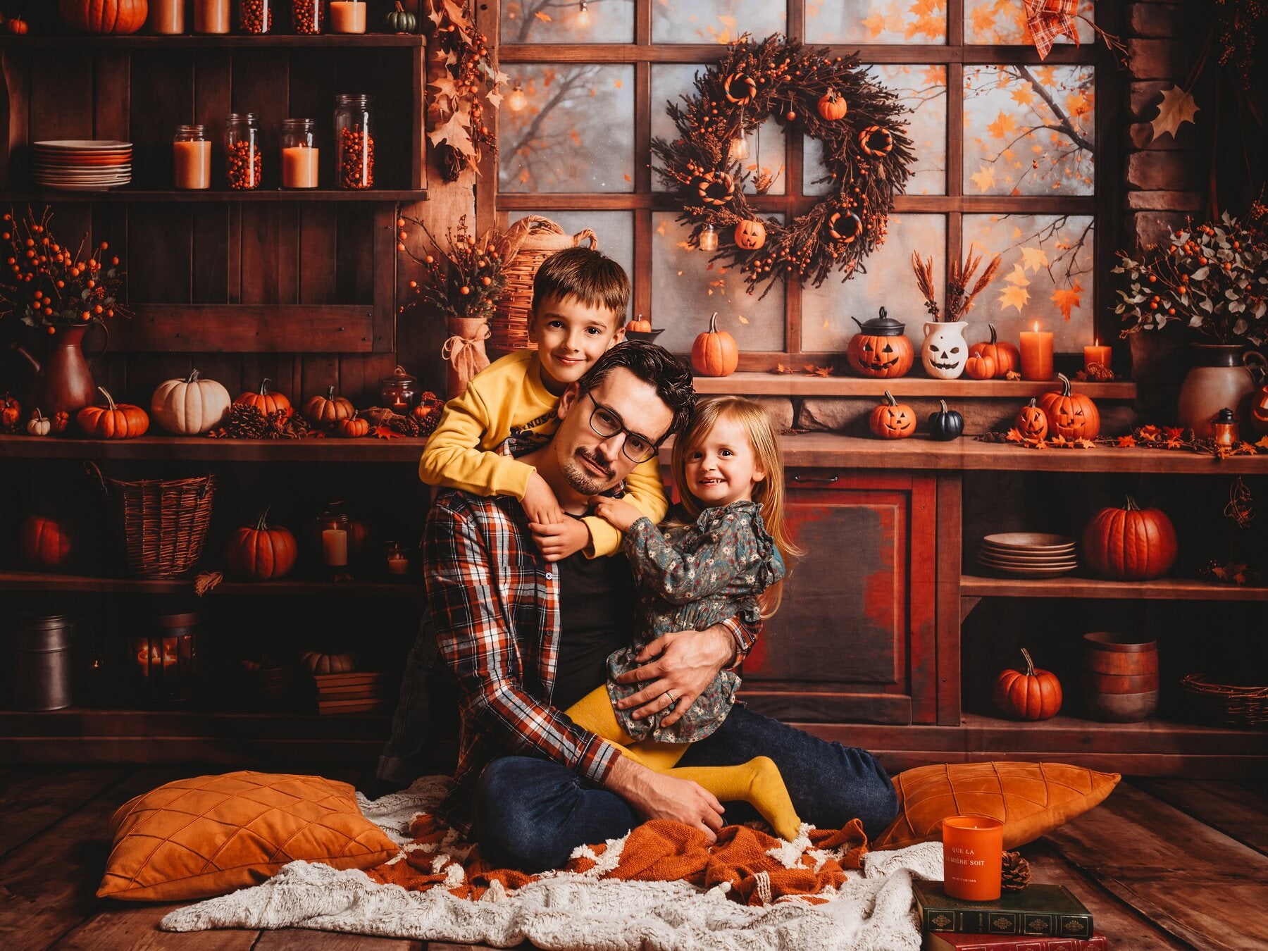 A family portrait in a seasonal studio scene