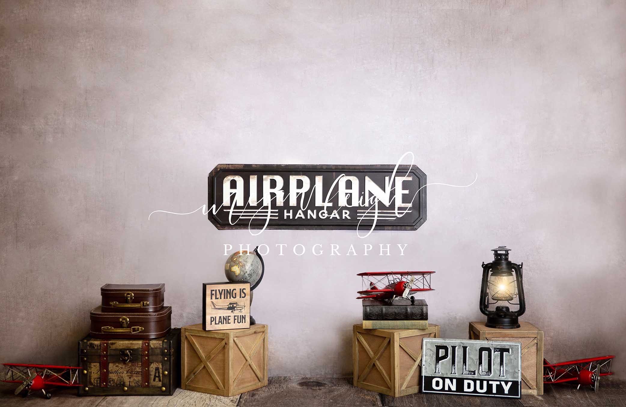 Kate Aircraft Hanger Backdrop Designed by Megan Leigh Photography