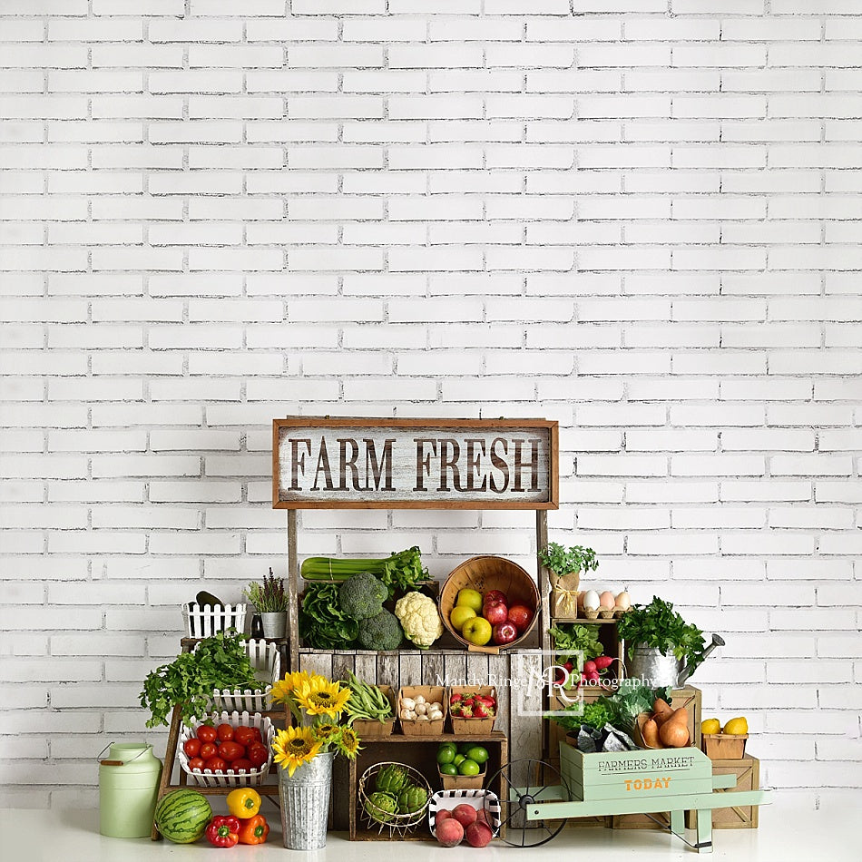 Kate Farm Fruits with White Brick Backdrop Designed By Mandy Ringe Photography